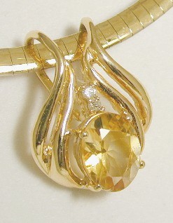 
Bold Oval Citrine and Diamond Slide Pendan
