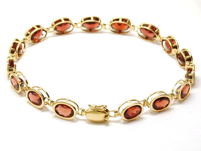 
Bezel set Garnet Line Bracelet 
