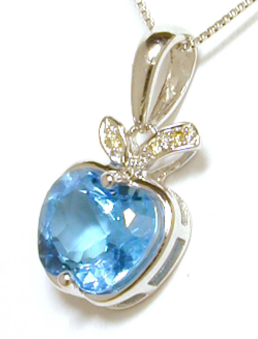 
Unusual Blue Topaz and Diamond Apple Pendant
