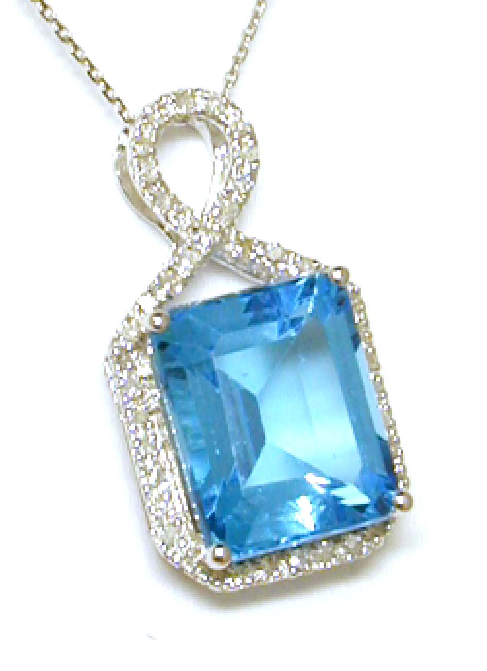 
Stunning Emerald-cut Blue Topaz and Diamond Pendant
