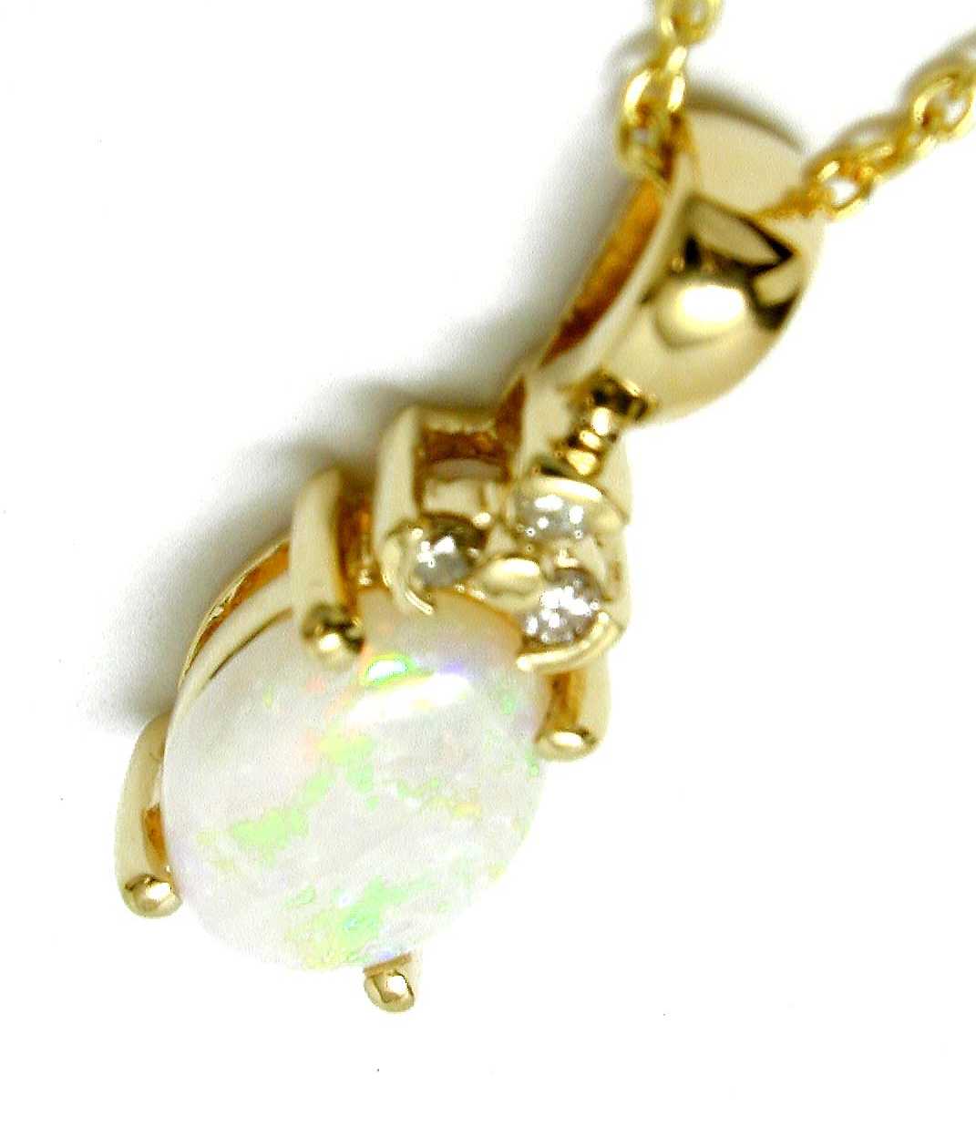 
Firey 8x6mm Oval Simulated Opal and Diamond Pendant
