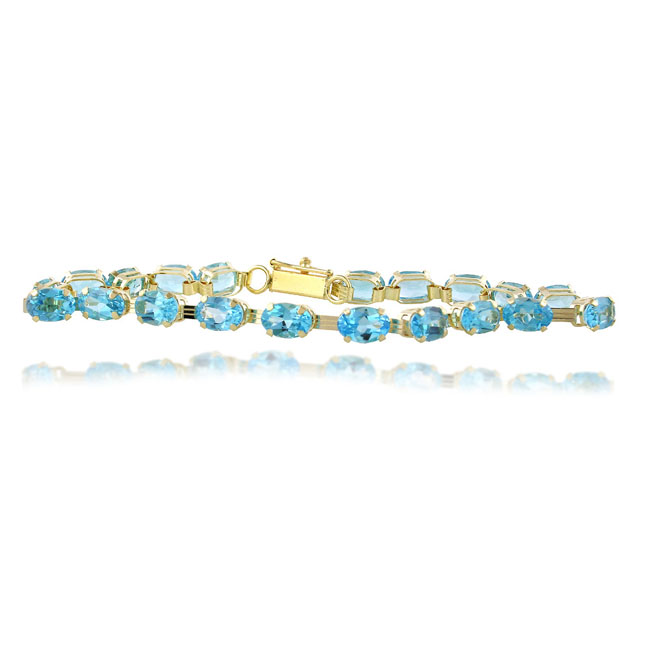 
10k Yellow 6x4 mm Oval Blue Topaz Bracelet - 7 Inch
