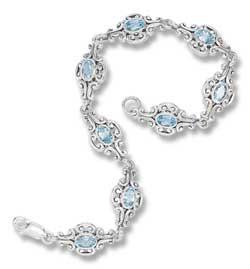 
Sterling Silver 7 Inch Designer Links Blue Topaz Stones Bracelet
